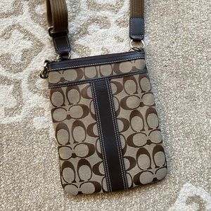 Coach brown travel crossbody bag
